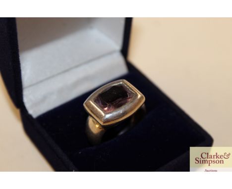 A 925 amethyst coloured dress ring 