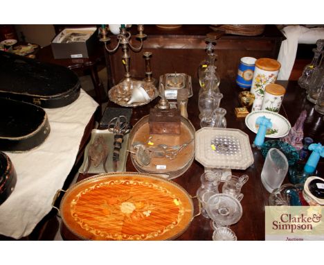 A quantity of plated ware to include a wine funnel, entreé dish candelabra and various other miscellaneous items 