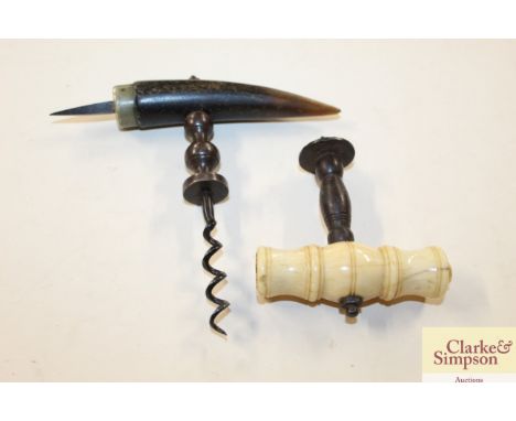 An ivory handled part corkscrew; and another corkscrew