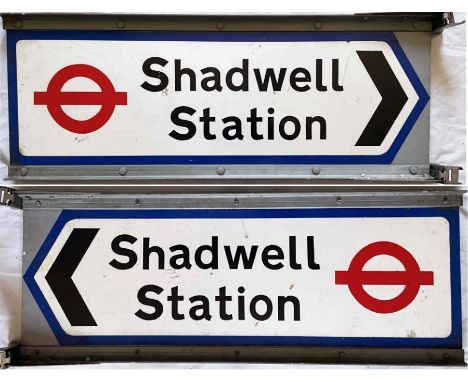 c1970s/80s local authority, aluminium DIRECTIONAL SIGN 'Shadwell Station' with London Transport roundel motif. A double-sided