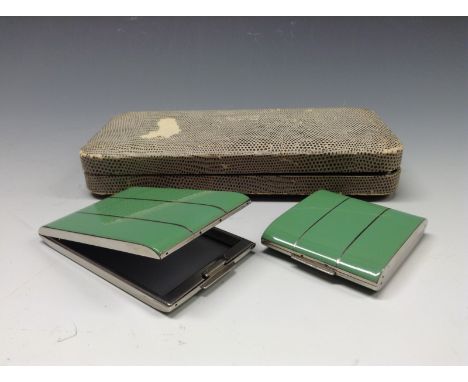 A 1930's Stratton compact and cigarette case, green enamelling with vertical lines, PAT 407784, cased.