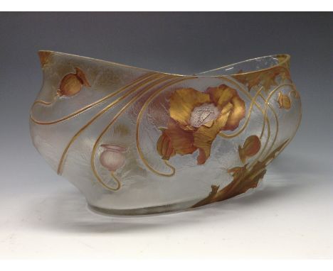 An Art glass flower trough, in relief with scrolling stylised poppies and foliage, picked out in gilt and red, on a frosted g