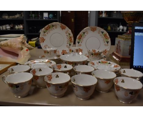 Around forty two pieces of vintage court china having a hand tinted floral transfer pattern and gilt detailing, included are 