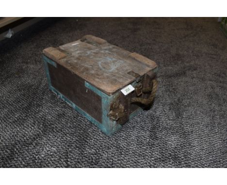 A small wooden ammunition box or similar having reinforced edges and rope handles, WK4 embossed to catch.