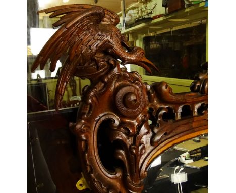 Large Renaissance style Carved Wood Beveled Wall Mirror. Small repair to finial, normal age splits or else good condition. Me