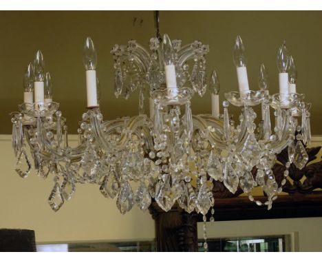 Vintage Maria Theresa style  Chandelier. Unsigned. Good Condition. Measures 18 Inches Tall and 30 Inches Wide. Shipping: Thir