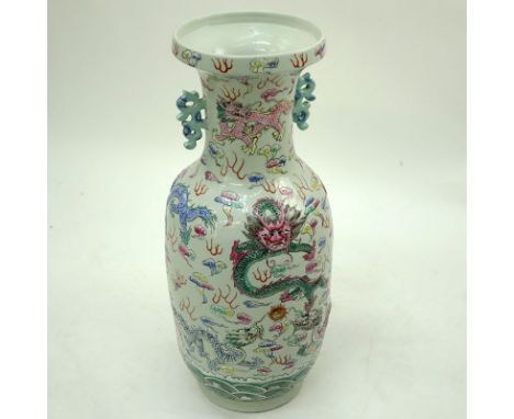 Early to Mid Century 20th Century Chinese Qing Style Handled Vase. Enamel hand painted raised dragon relief with wave and scr