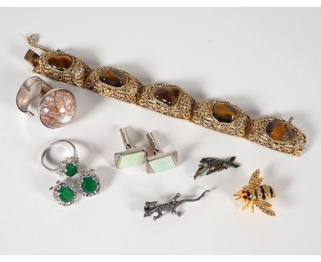 SCHMUCKKONVOLUT, vesch Manuf, 20. Jh.,bestehend aus: Kissengliederarmband, 5 Tigeraugen, L. 17,5 cm, Sicherheitsverschluss, P