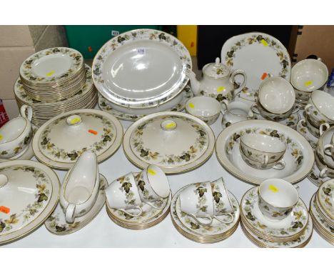 A ROYAL DOULTON 'LARCHMONT' PATTERN DINNER SET, comprising three covered tureens, one serving dish, two gravy jugs and stands