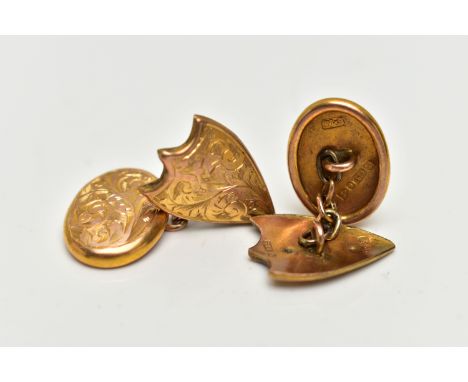A PAIR OF EARLY 20TH CENTURY 9CT GOLD CUFFLINKS, each cufflink designed with an oval and a shield shape panel with a floral e