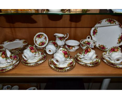 A THIRTY PIECE ROYAL ALBERT OLD COUNTRY ROSES PART TEA SET, comprising a cake plate, a cream jug, a sugar bowl, a covered sug