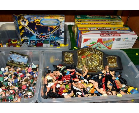 FOUR BOXES OF TOYS AND GAMES, including Corinthian Microstars football figures, wrestling action figures, The Simpsons themed