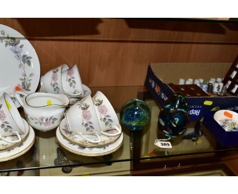 A ROYAL WORCESTER 'JUNE GARLAND' PATTERN TEA SET AND A COLLECTION OF CERAMIC THIMBLES, comprising a cake plate, milk jug, six