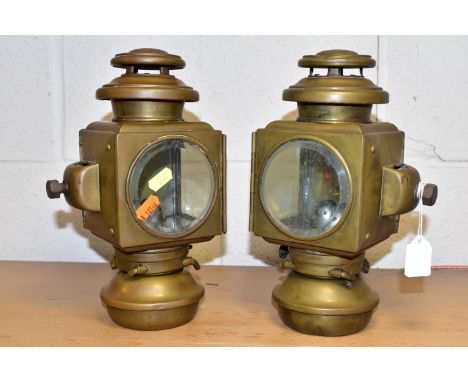 A PAIR OF AMERICAN EARLY BRASS CAR LAMPS, stamped 'E &amp; J Detroit Michigan' to top, height 26cm (2) (Condition Report: gen