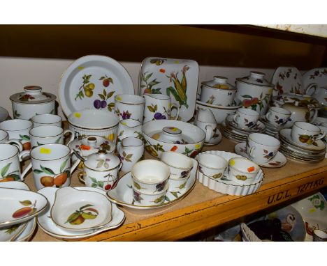 AN EXTENSIVE ROYAL WORCESTER 'EVESHAM' DINNER SERVICE, comprising two oval tureens and covers, an oval casserole dish and cov