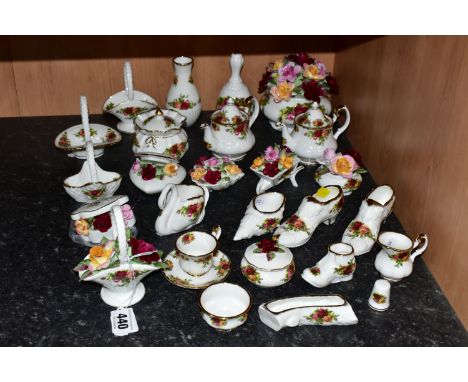 A COLLECTION OF ROYAL ALBERT 'OLD COUNTRY ROSES' PATTERN GIFTWARE, comprising a pot of china flowers, bell, five baskets, two