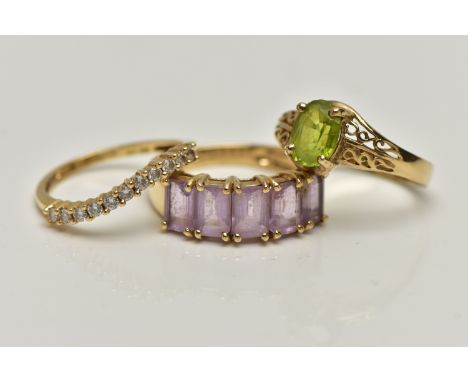 THREE GEM SET RINGS, the first set with a row of colourless cubic zirconia, hallmarked 14ct Birmingham, ring size L, approxim