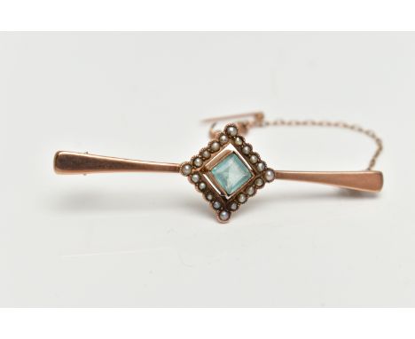 A ROSE METAL, GEM SET BAR BROOCH, tapering polished bar, displaying a square cut pale blue stone assessed as paste, milgrain 