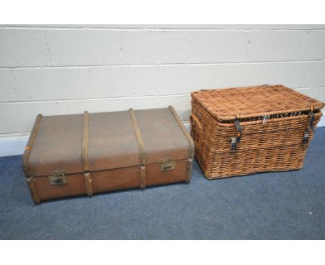 A WICKER BASKET, width 76cm x depth 46cm x height 49m, along with vintage travelling trunk (condition:-trunk damaged) (2)
