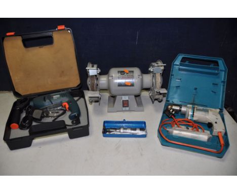 A SIP 6   BENCH GRINDER along with a Black and Decker KR650RE drill, a Wolf drill (all PAT pass and working) and a DSC impact