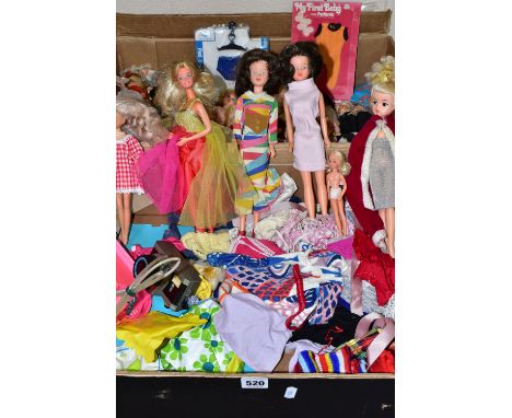 A QUANTITY OF ASSORTED DOLLS, CLOTHING AND ACCESSORIES, to include boxed 1970's Fashion Photo Barbie, doll marked 'Mattel 196