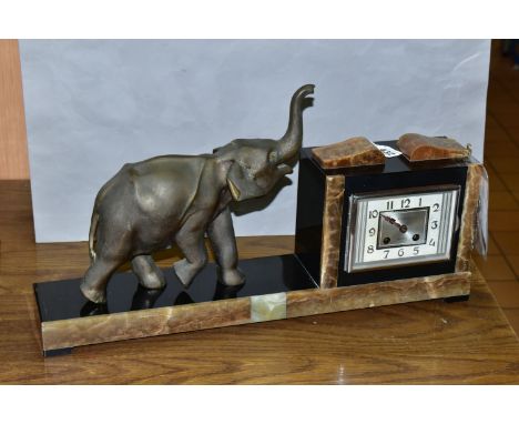 A FRENCH ART DECO MARBLE MANTEL CLOCK, Olivaux Renn, with key and pendulum and figure of an elephant with a raised trunk (1) 