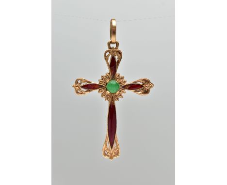 A YELLOW METAL ENAMEL CROSS PENDANT, scroll detailed cross with red enamel, to the centre is a claw set green chalcedony cabo