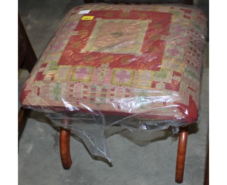		A Victorian tapestry stool on walnut 'x' trestle supports