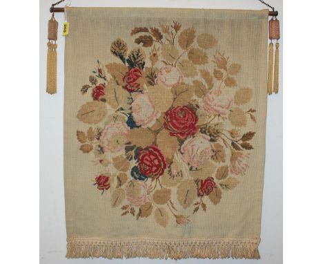 		A tapestry wall hanging, roses and foliage, the copper rail hung with tassles. 30' high