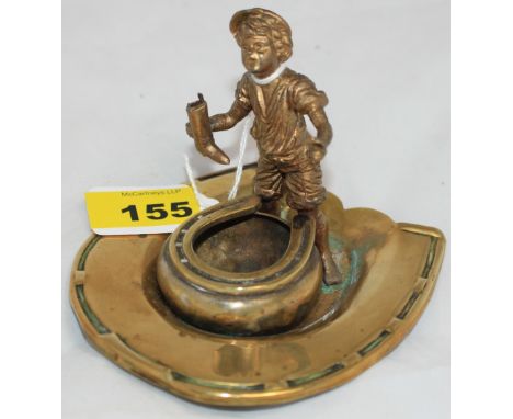 		A Victorian brass horseshoe form go-to-bed light. 4 1/2' wide
