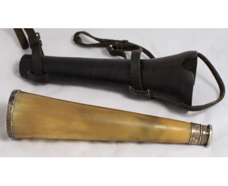 		A Victorian conical horn hunting flask with silver mounts. 9 1/4'. Repair to screw-top, together with a leather hunting hor