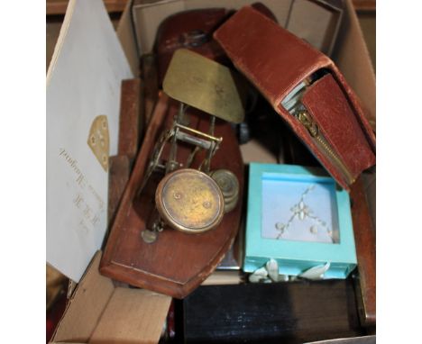 		A box of sundries to include leter scales, spirit levels etc.