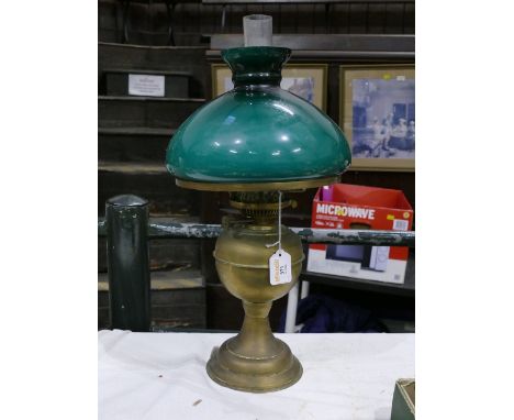 Brass oil lamp with green glass shade