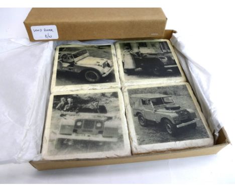 Boxed set of 4 black and white ceramic Landrover coasters.