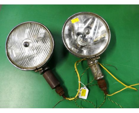 2 Vintage Lucas headlamps.