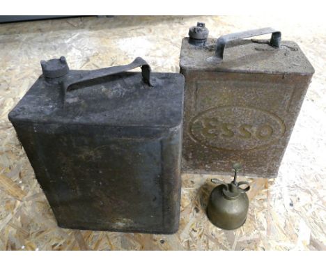 2 Vintage rusty petrol cans, one marked Esso, and a small brass oil can.