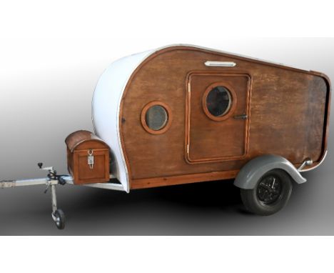 Teardrop caravan / camping trailer.  Streamlined, compact size, lightweight for easy towing. Small kitchenette hatch to rear,