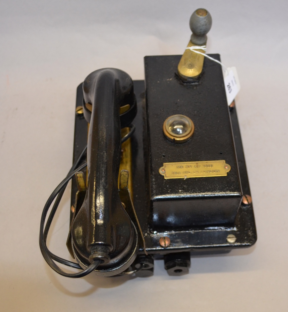 20th Century windup telephone by MFG Co. London with brass plaque reading 'MK XV AP 13231'