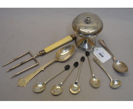 Quantity of hallmarked silver items to include an ivory-handled bread fork, Sheffield 1922, and a dressing table powder compa