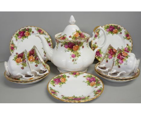 A collection of Royal Albert Old Country Roses china (first and second quality), includes cake stand, eight cups, various sau