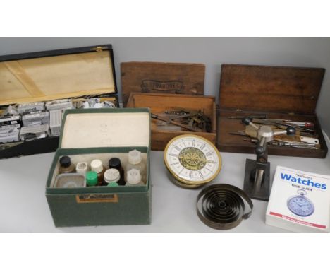 A collection of clock and watch repair items, tools, batteries, etc.