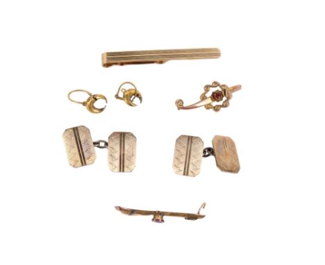 A small group of gold and other jewellery. Including a  9ct gold hallmarked tie clip weighing 4.3g, 9ct gold and silver cuffl