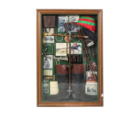A framed display of vintage horse riding accessories. Including a hat, pair of boots, 1954 Royal Ascot programme, a whip, pai