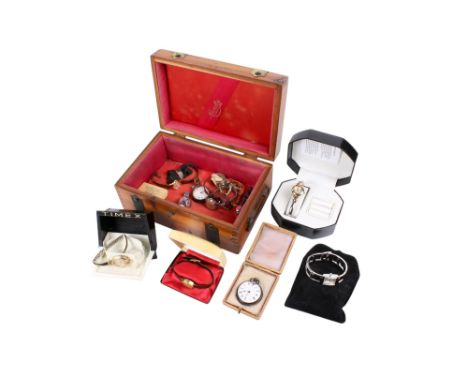 A small group of ladies wristwatches and pocket watches. Including two silver cased examples, Oris, Ingersoll, etc, in a wood