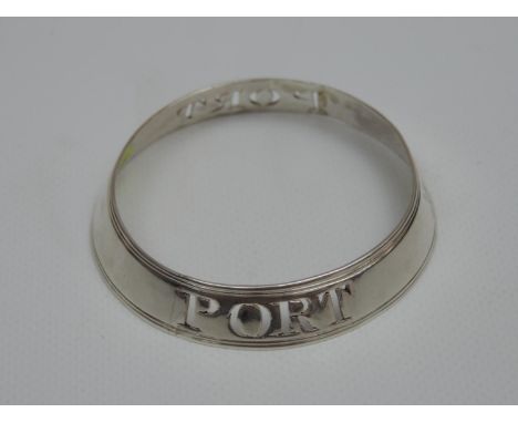 A George III Silver Neck Ring Wine Label Pierced 'PORT’, with Engraved Armorial' - Hallmarked for London 1795 by James Hyde 