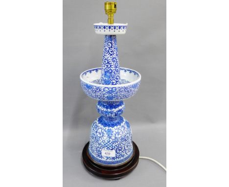 Chinese style blue and white ceramic table lamp base on a turned wooden stand