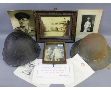 Two early 20th century Army tin helmets, a collection of black and white photographs etc., (a lot) 