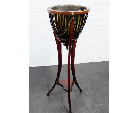 Mahogany jardiniere with brass planter, on tripod supports with undertier, 100cm