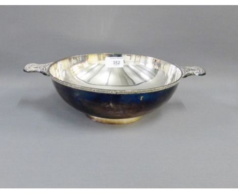 Large silver plated quaich style bowl, the handle with Celtic knot pattern, 32cm wide