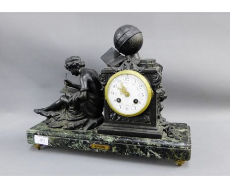Etude, a Spelter figural mantle clock on a rectangular green hardstone base, 40cm long